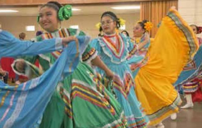 Latin American dancers entertain the crowd at the Cinco de Mayo fundraiser and festivities on May 5, at in the Education Building at the Old Fairgrounds, 220 N. Country Club Road in El Reno.