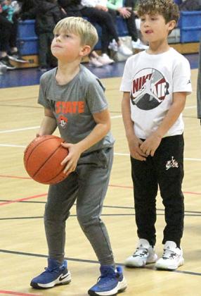 Bryce Lucas lines up for a shot during the Yukon Parks and Recreation free throw contest. Winners in each division will compete against Mustang winners during halftime of a high school basketball game. Photo / Michael Pineda