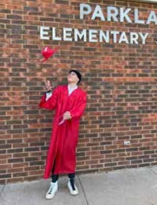YPS senior Calvin Holman IV graduates a week early in a special ceremony at Parkland Elementary School, 2201 Cornwell Drive, in Yukon. Holman will miss the May 20 YPS graduation due to chemotherapy treatments. Photo provided.